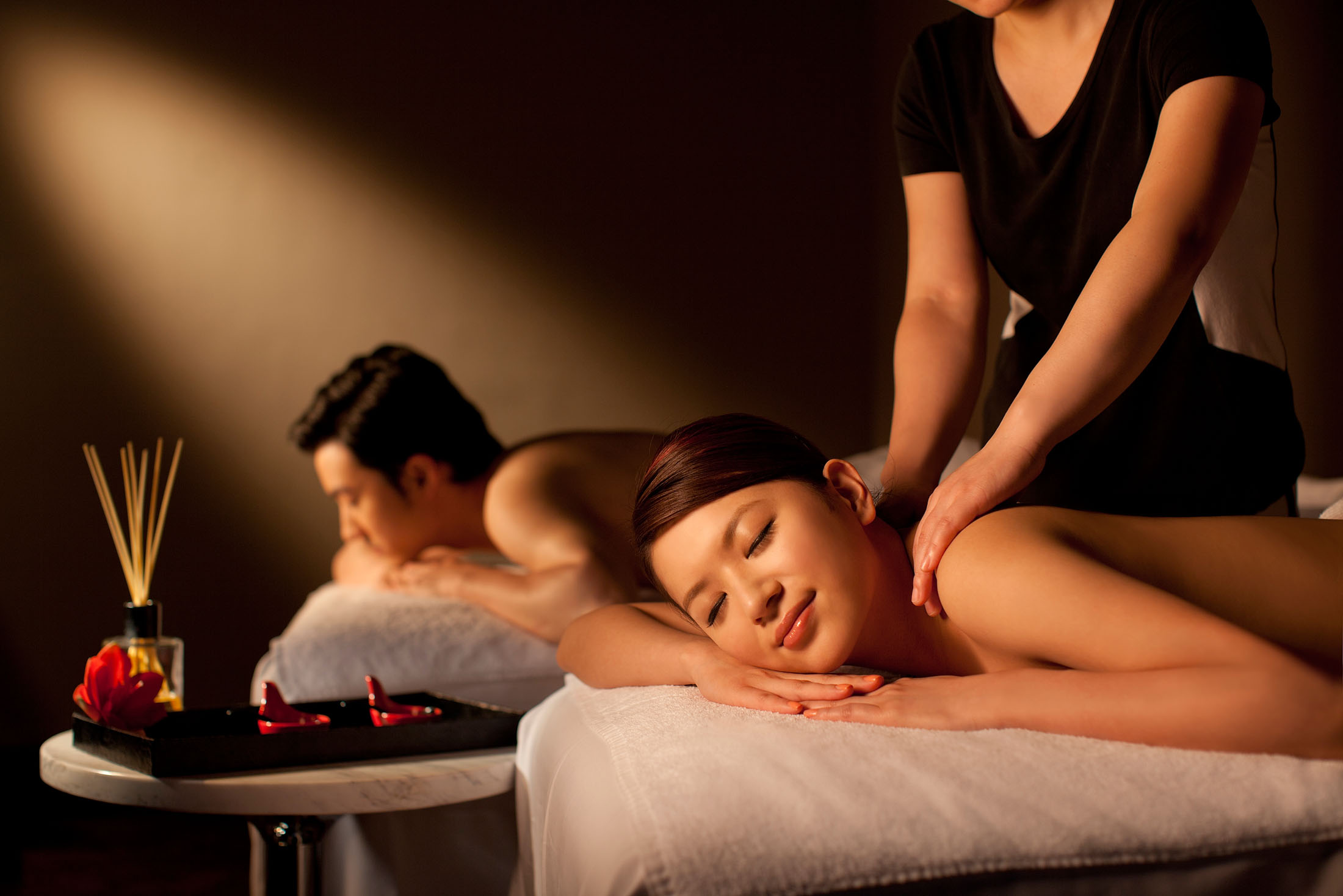 Asian masseuse seduces client into fan image